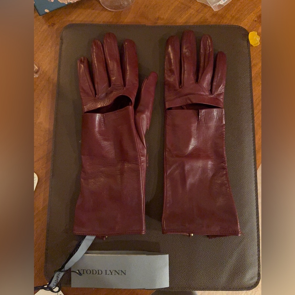 Chic Burgundy Leather Gloves with Gold Zipper